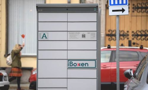 Bildet illustrerer et selvbetjent hentepunkt fra iBoxen, utplassert i en gate.